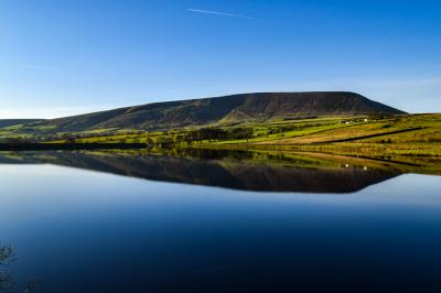 Pendle hill reflection in black moss © Ian Smith 